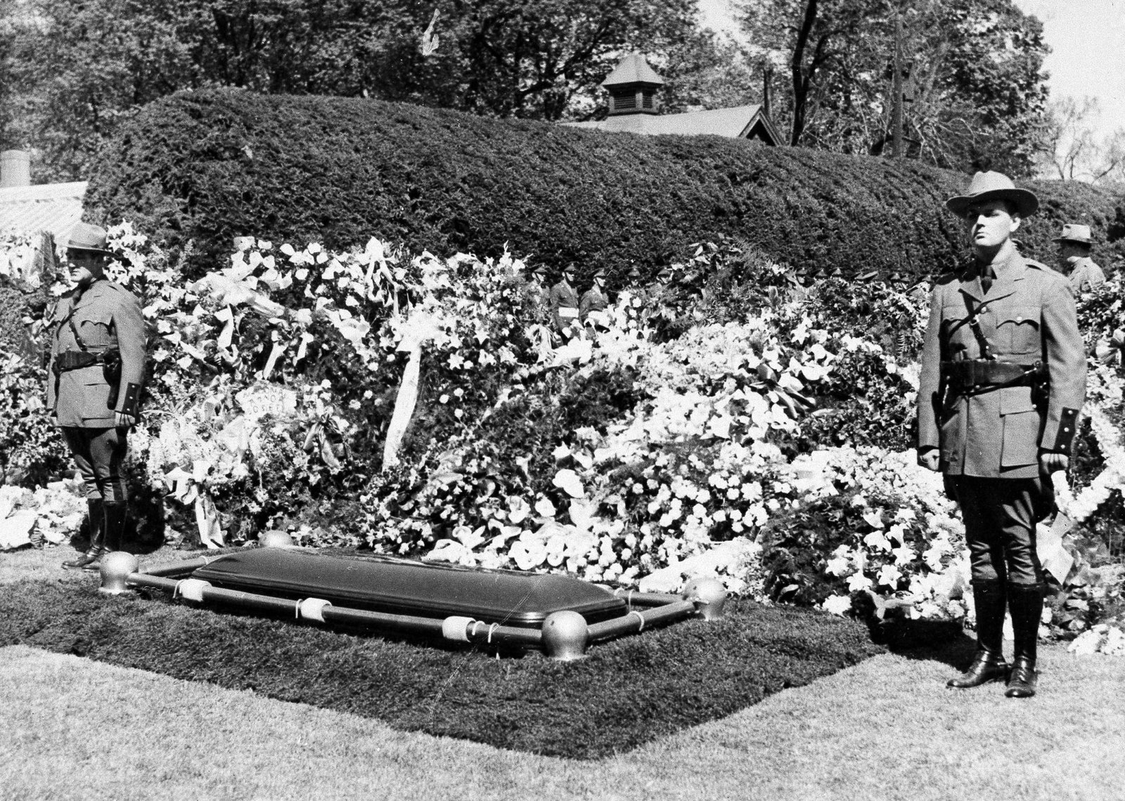 New York State Police guard the grave of President Franklin D. Roosevelt on his estate at Hyde Park, N.Y., April 15, 1945, following his funeral. (AP Photo)